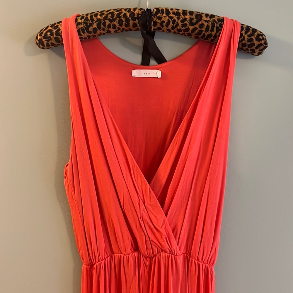 Woman’s sleeveless coral maxi dress